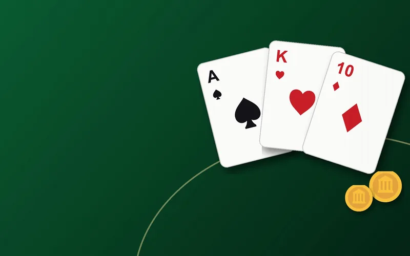 Ace, king and ten playing cards on a green felt table with chips